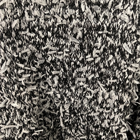 Black cold shoulder sweater with white feather fun material. Long and stretchy. - Picture 2 of 3